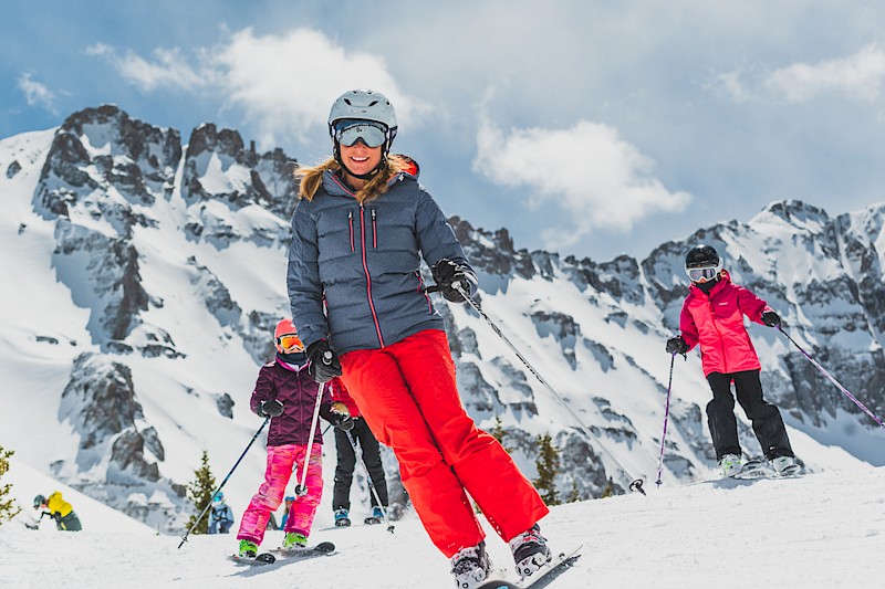 family skiing in Telluride, CO at top of Lift 12