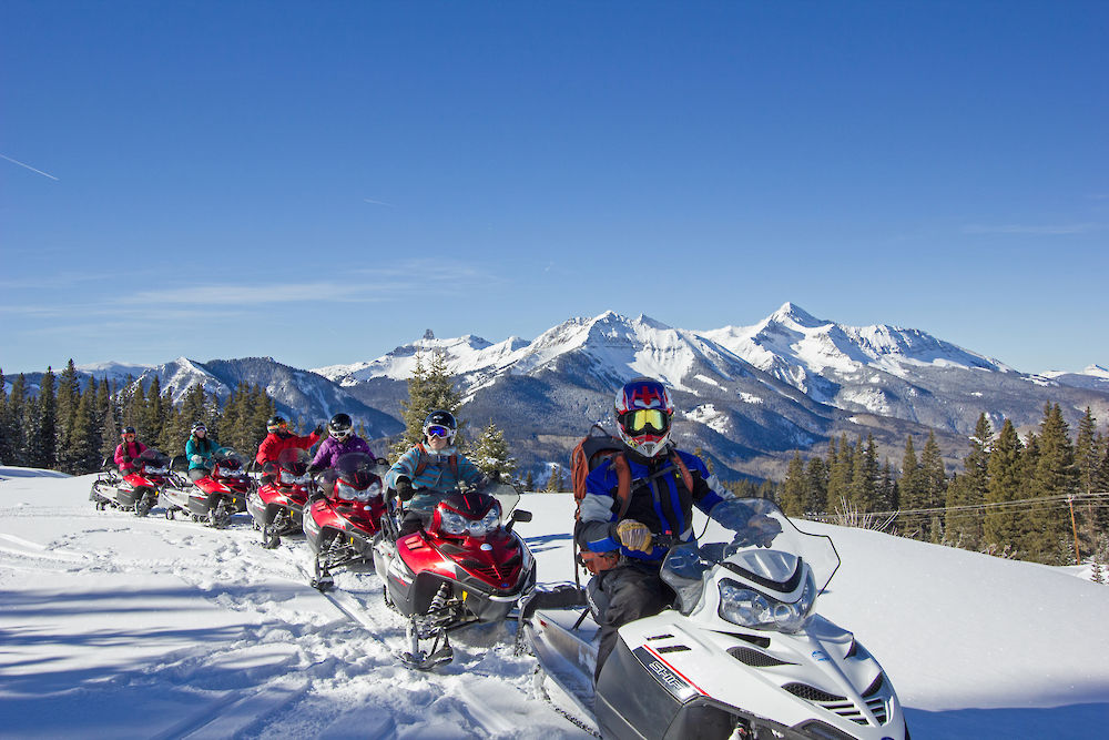 off mountain adventure snowmobiing in Telluride, CO